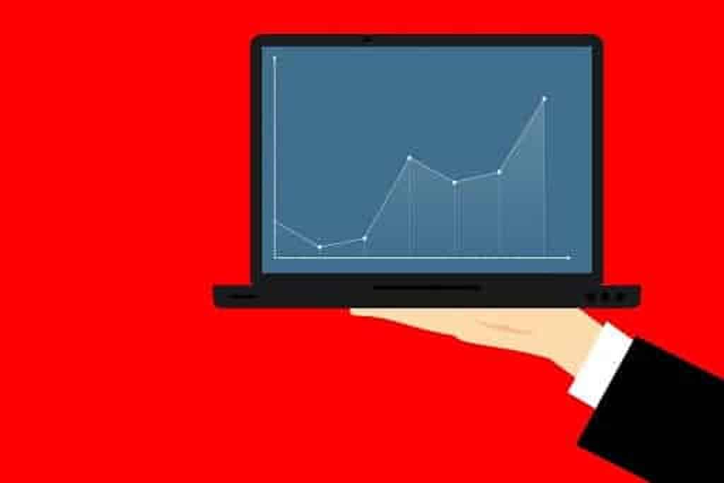 ilustração de um notebook exibindo gráficos na tela, representando os templates do Power BI
